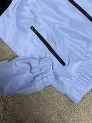 Chandal nike negro y morado